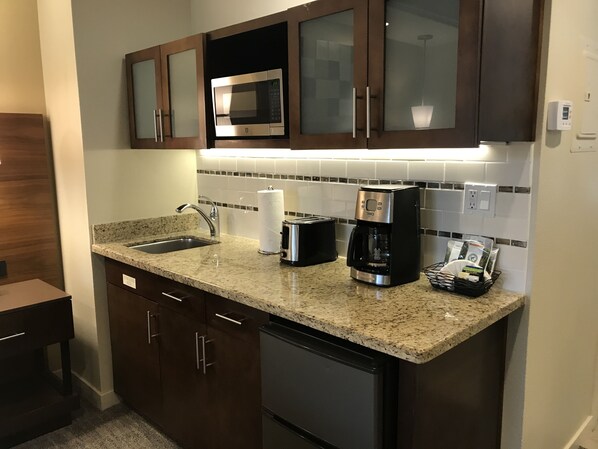 Fridge, microwave, coffee/tea maker, toaster