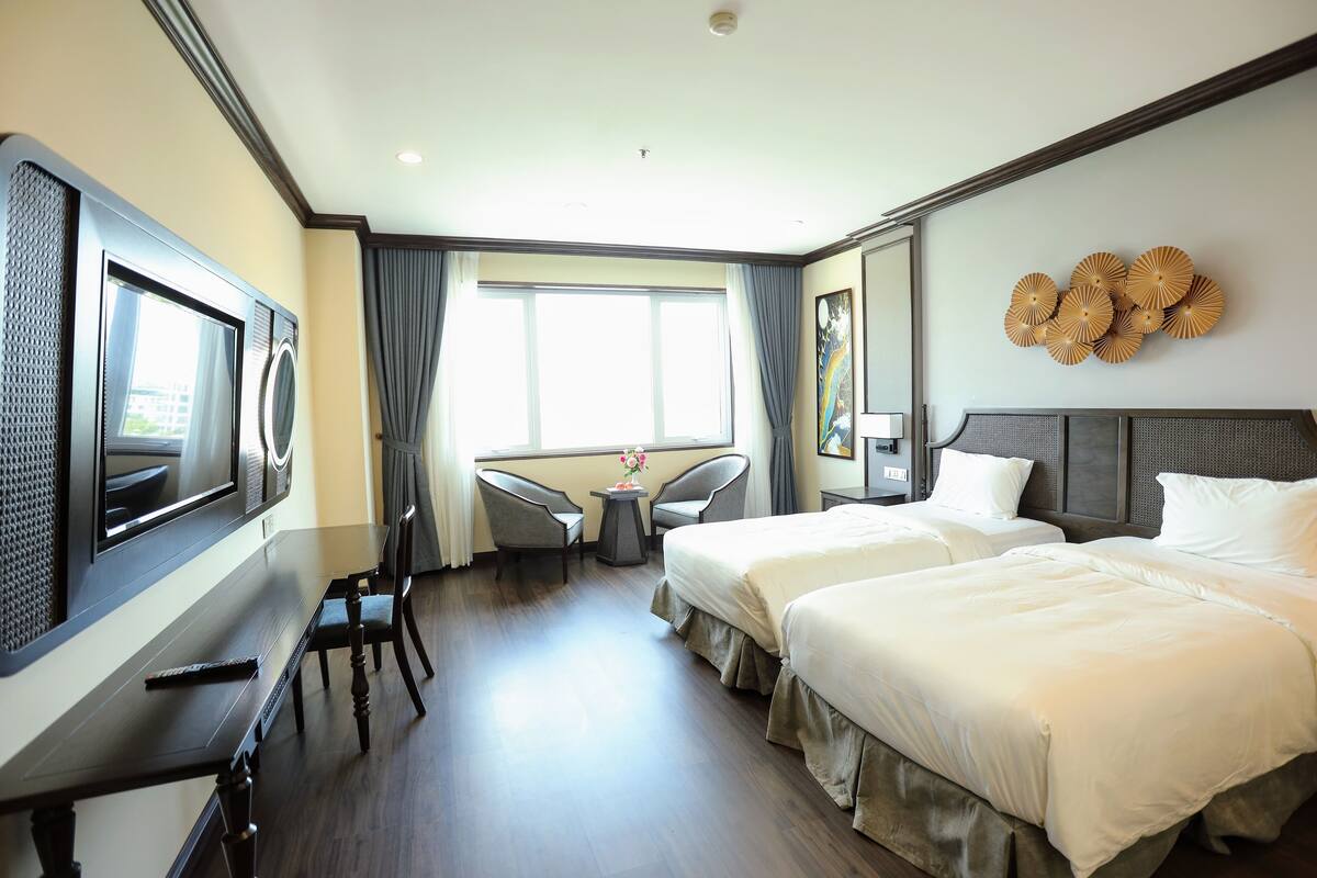 Family Connecting Room - 2 bedrooms | Minibar, in-room safe, desk, laptop workspace