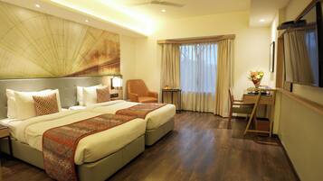 Habitació amb dos llits individuals Deluxe | Roba de llit hipoal·lergògena, minibar i caixa forta a l'habitació