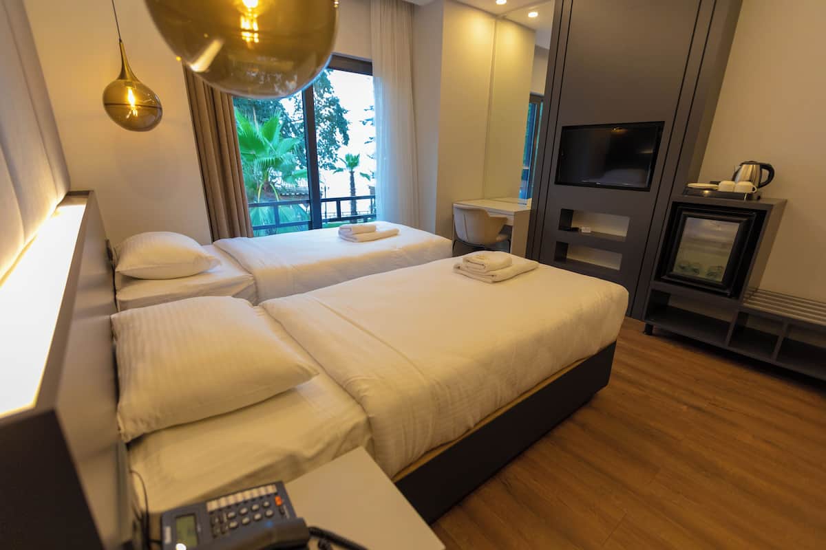 Economy kamer | 1 slaapkamer, luxe beddengoed, donzen dekbedden, een minibar