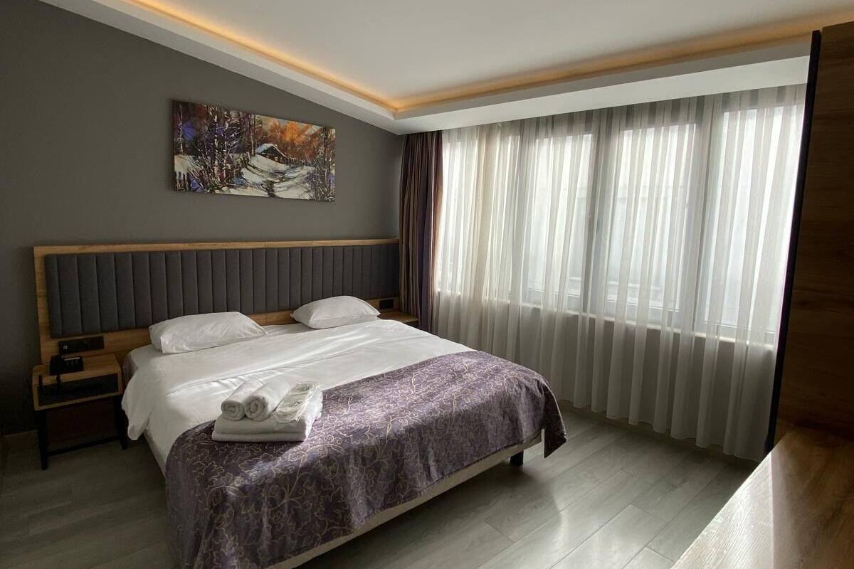 Standard Room City View | Sängtillbehör av högsta kvalitet och minibar
