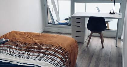 Appartement lumineux dans un parc arboré proche des commerces et des tranports