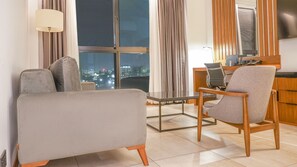 Premium Suite | Minibar, in-room safe, individually furnished, desk