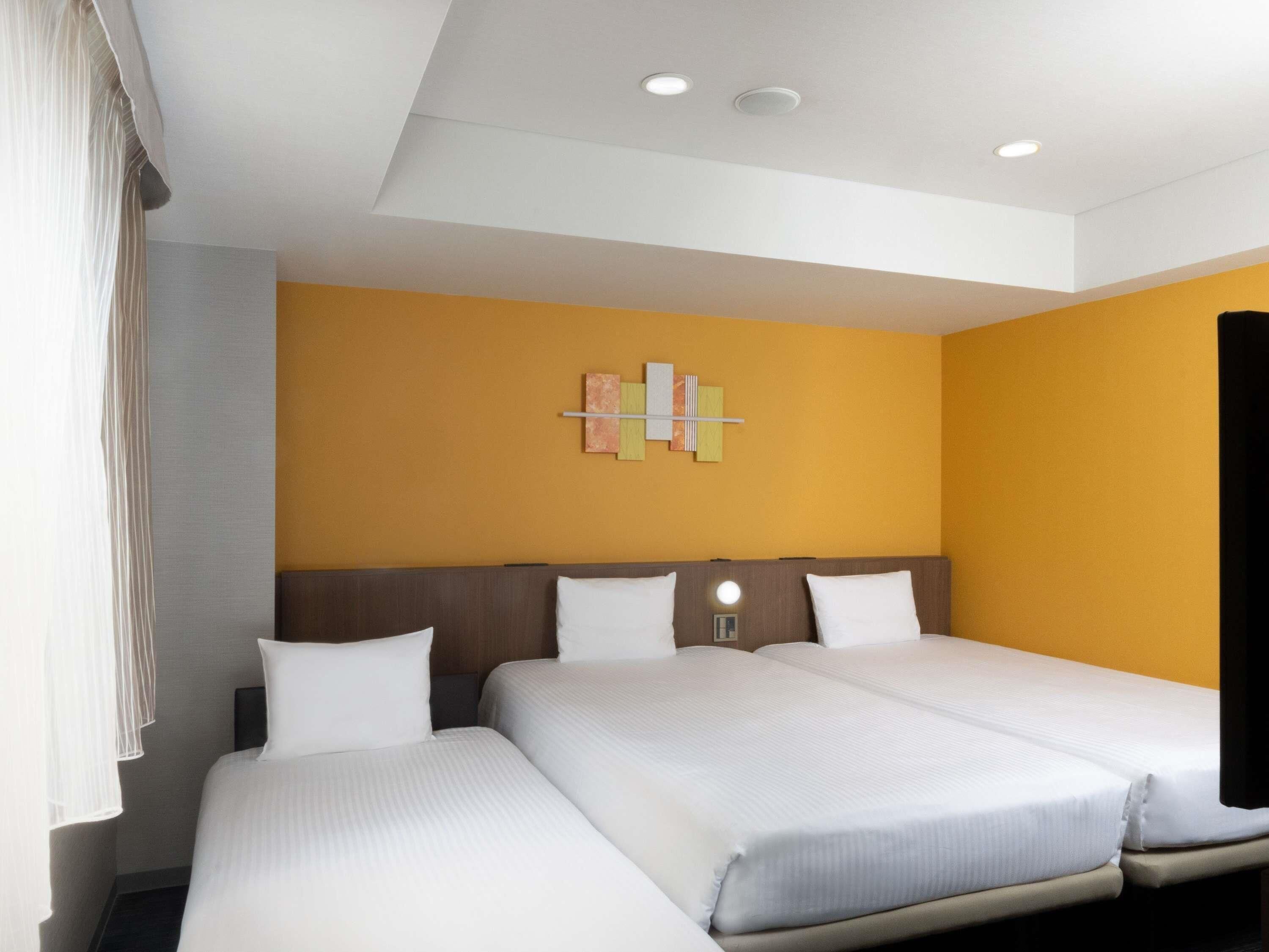 Superior Room (2 Single Beds and 1 Extra Bed) | In-room safe, desk, laptop workspace, blackout drapes