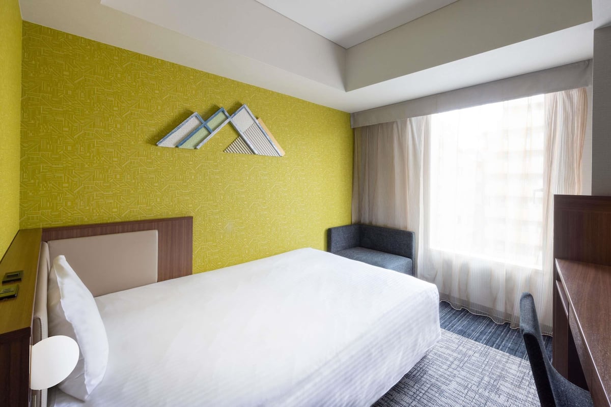 Standardzimmer, 1 Einzelbett, Nichtraucher | Daunenbettdecken, Zimmersafe, Schreibtisch