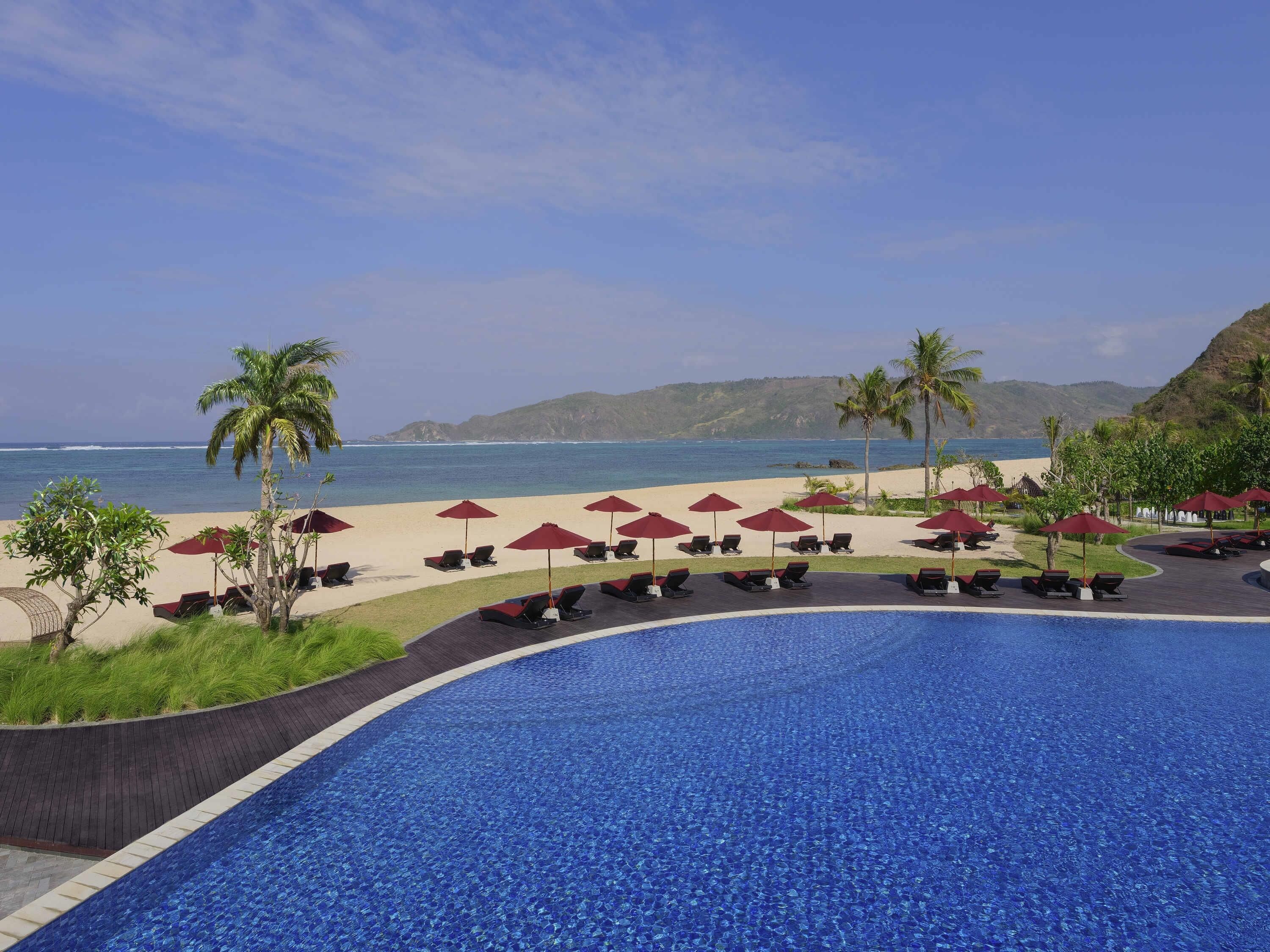 Outdoor pool, open 8:00 AM to 7:00 PM, pool umbrellas, pool loungers