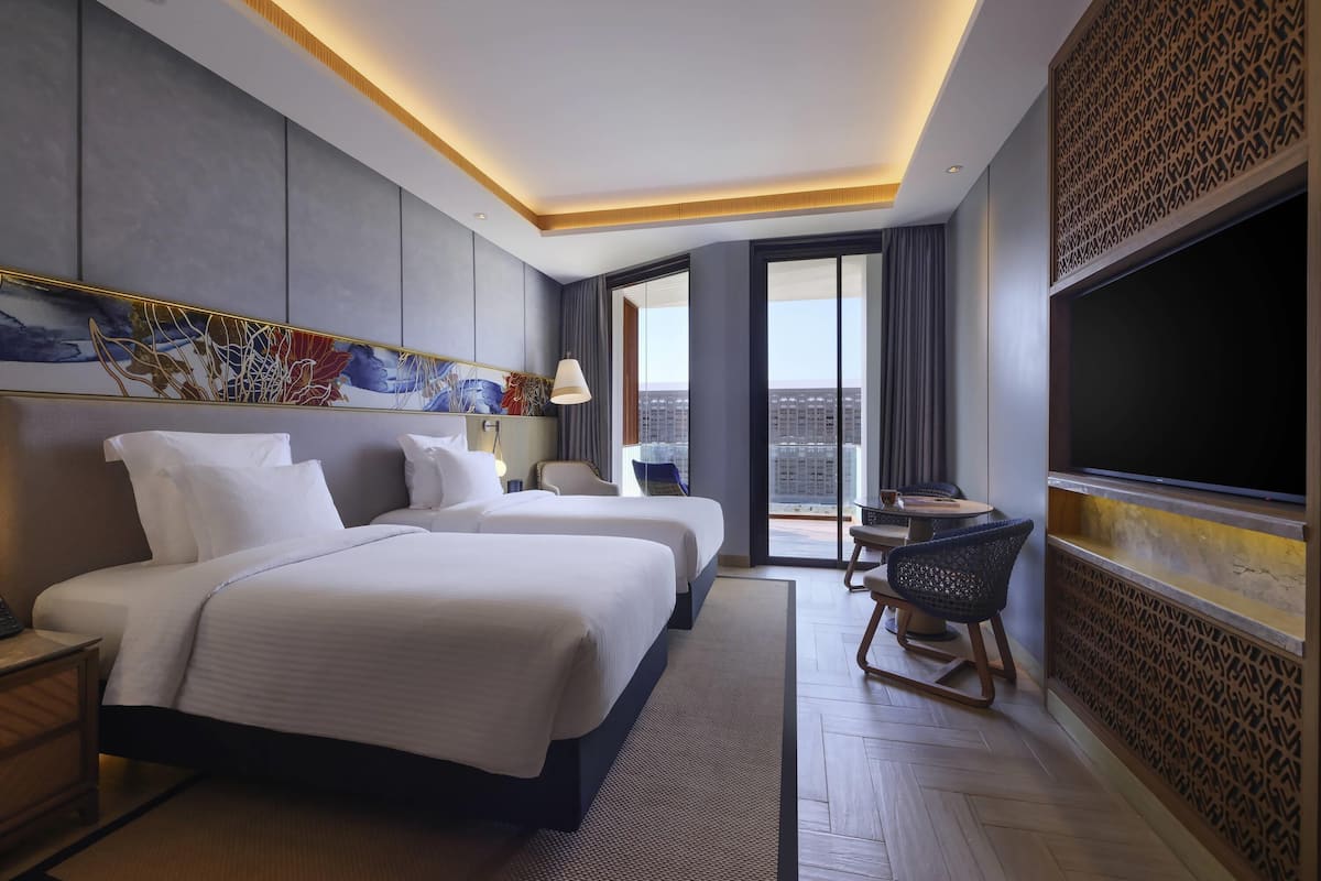 Pillow-top beds, minibar, in-room safe, laptop workspace