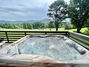Outdoor spa tub - Wearadise Mountain Views Home features Hot Tub and Fire Pit by RedAwning (Sevierville)