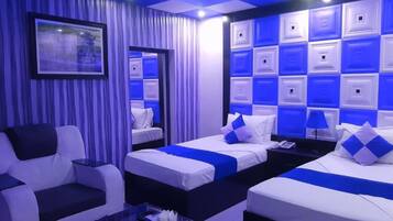 Habitación triple Deluxe | Wifi gratis y ropa de cama