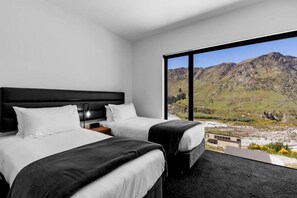 2 bedrooms, desk, iron/ironing board, travel crib