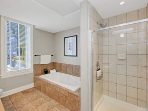 Bathtub, hair dryer, towels, soap