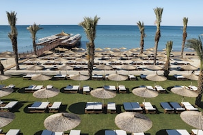 Private beach, white sand, beach cabanas, sun-loungers