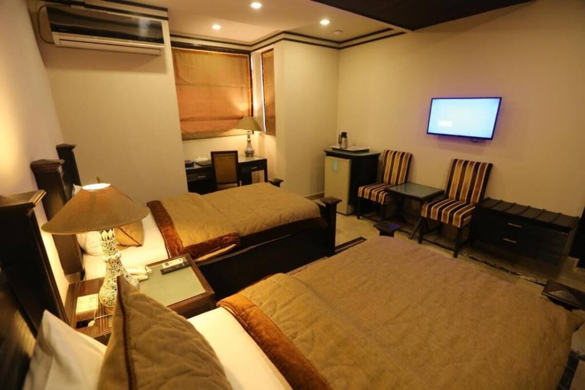 Kamar Triple Deluks | Wi-Fi gratis dan seprai linen