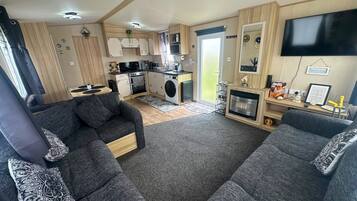 30-inch TV with cable channels, fireplace