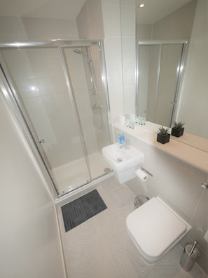 Shower, towels, soap, shampoo