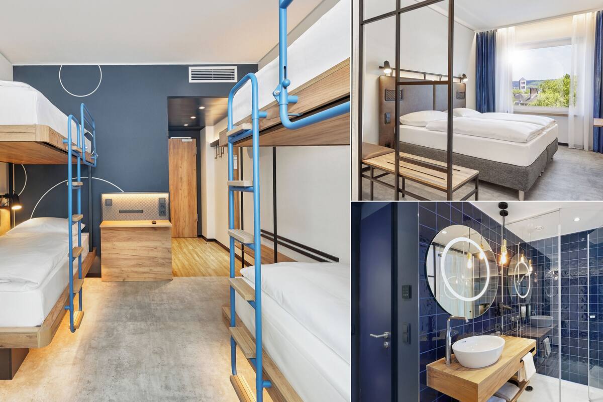 Ett modernt hotellrum med våningssängar, ett badrum med en stor spegel och utsikt över omgivningarna.