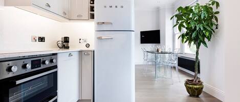 Apartment | Private kitchen | Fridge, microwave, stovetop, dishwasher