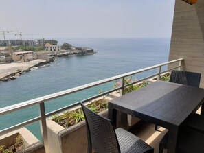 Outdoor dining - Silvia's 1 BR beachfront apartment / 24 h electricity (Tabarja)