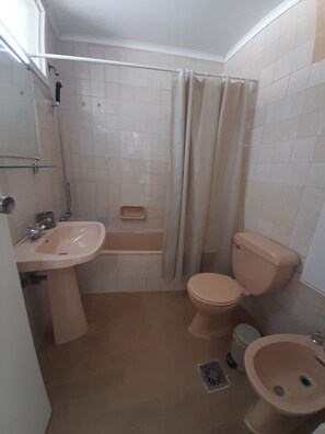 Bidet, towels, soap, shampoo