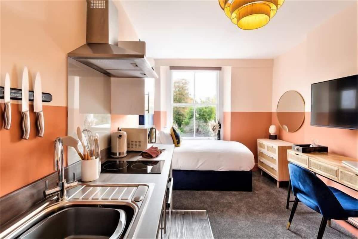 1 bedroom, desk, laptop workspace, iron/ironing board
