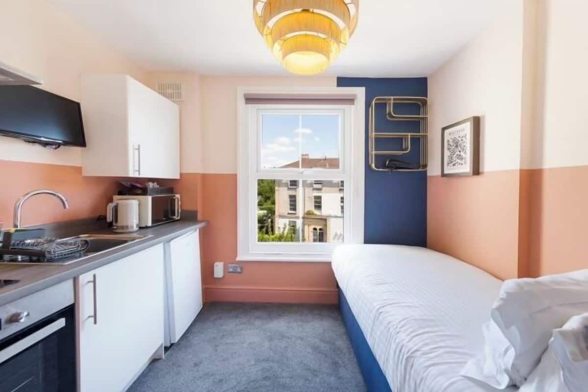 1 bedroom, desk, laptop workspace, iron/ironing board