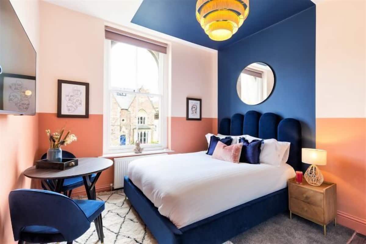 1 bedroom, desk, laptop workspace, iron/ironing board