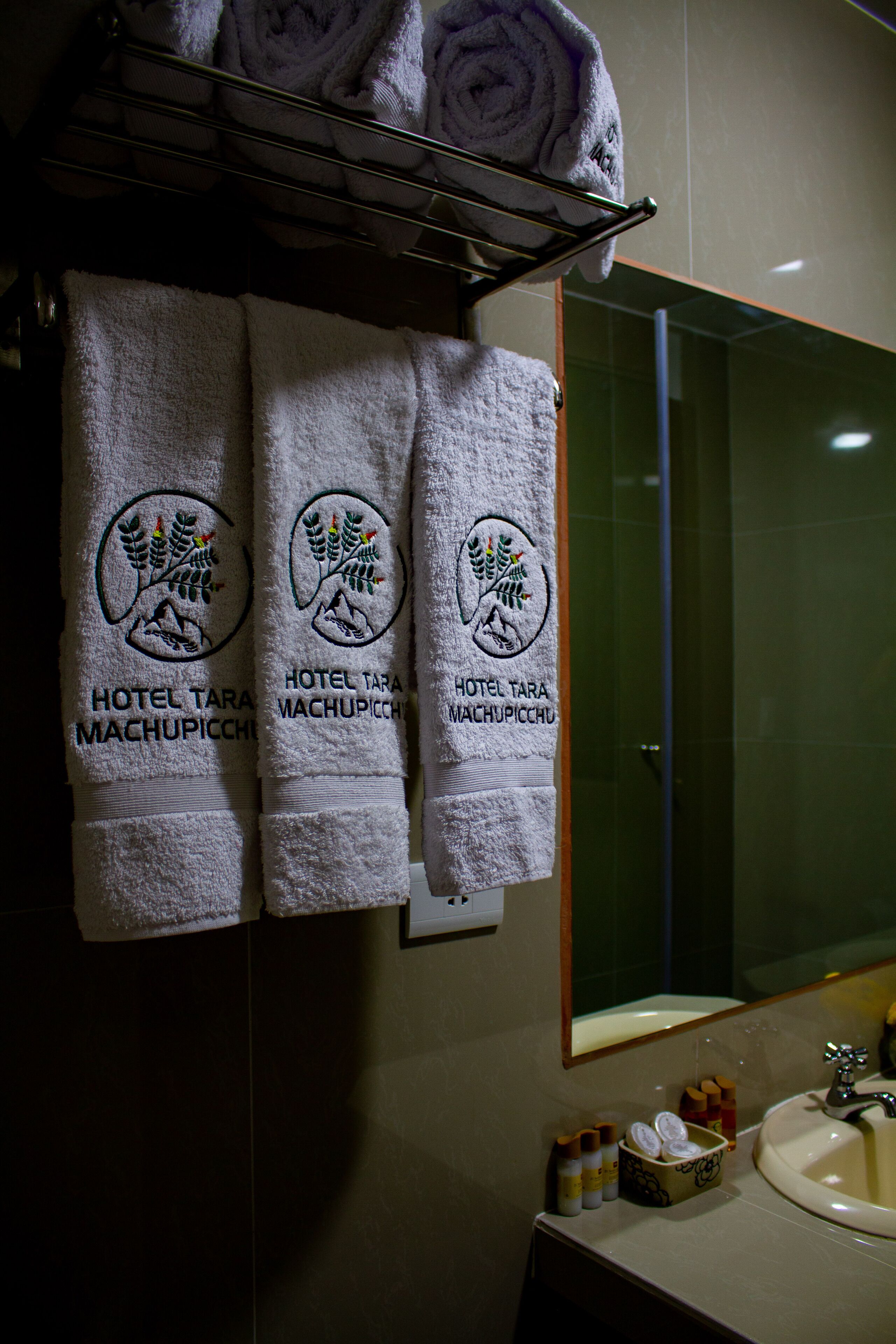 family room | bathroom | shower, rainfall showerhead, hair dryer, towels