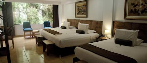 Family Room | Pillowtop beds, in-room safe, iron/ironing board, free WiFi