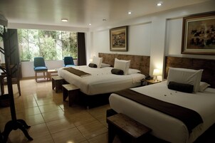 Family Room | Pillowtop beds, in-room safe, iron/ironing board, free WiFi