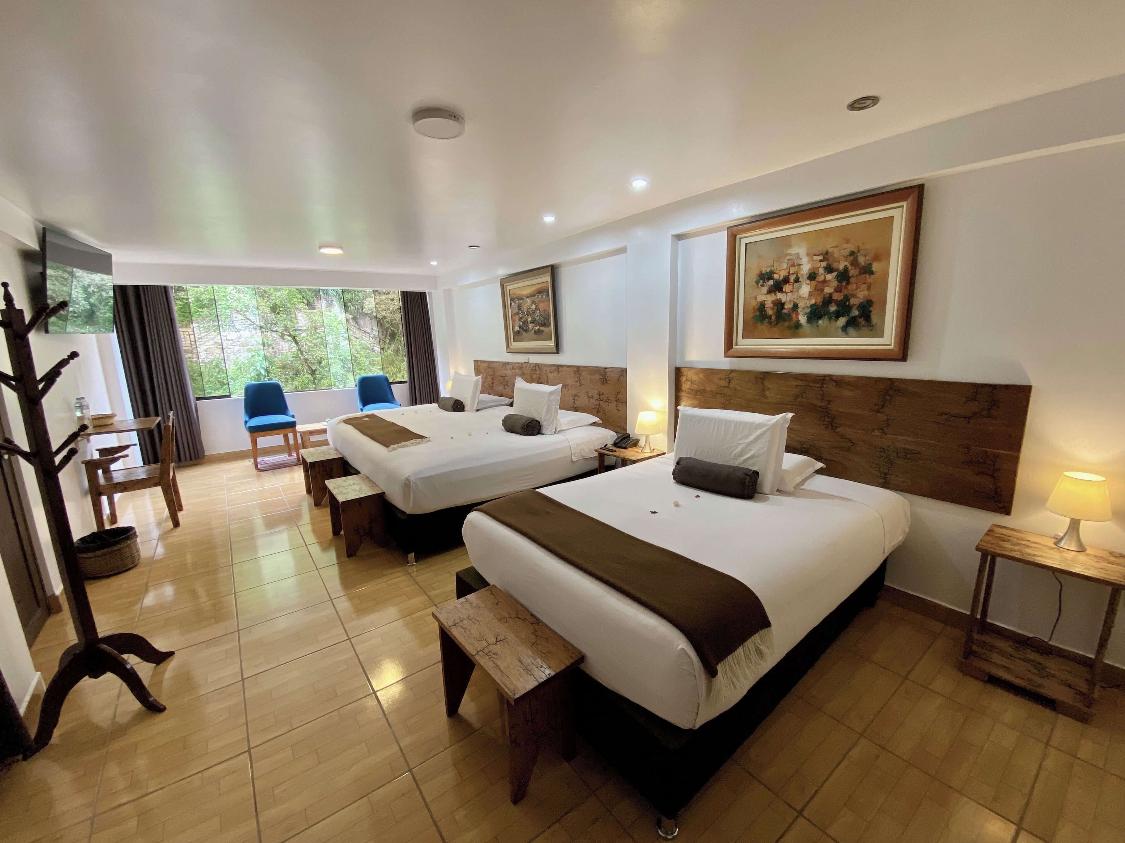 family room | 1 bedroom, pillow-top beds, in-room safe, iron/ironing board