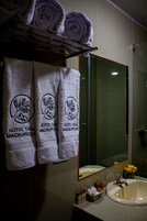 Shower, rainfall showerhead, hair dryer, towels