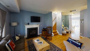 Smart TV, fireplace, books