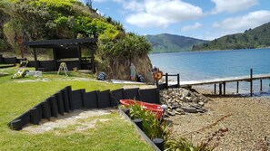 On the beach, sun-loungers - Beachfront Paradise Retreat in your own Private Bay and Floating Jetty (Marlborough)