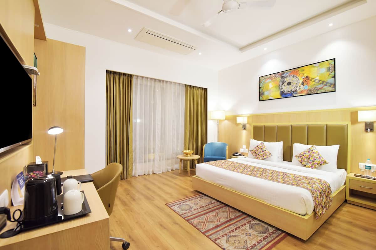 Quarto superior, 1 cama King, para não fumantes | Comodidades do quarto