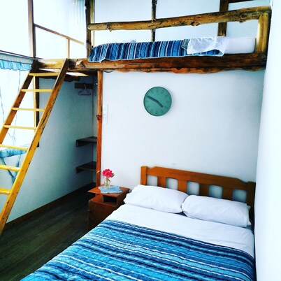 Habitación familiar con balcon privado alejado del bullicio de la ciudad