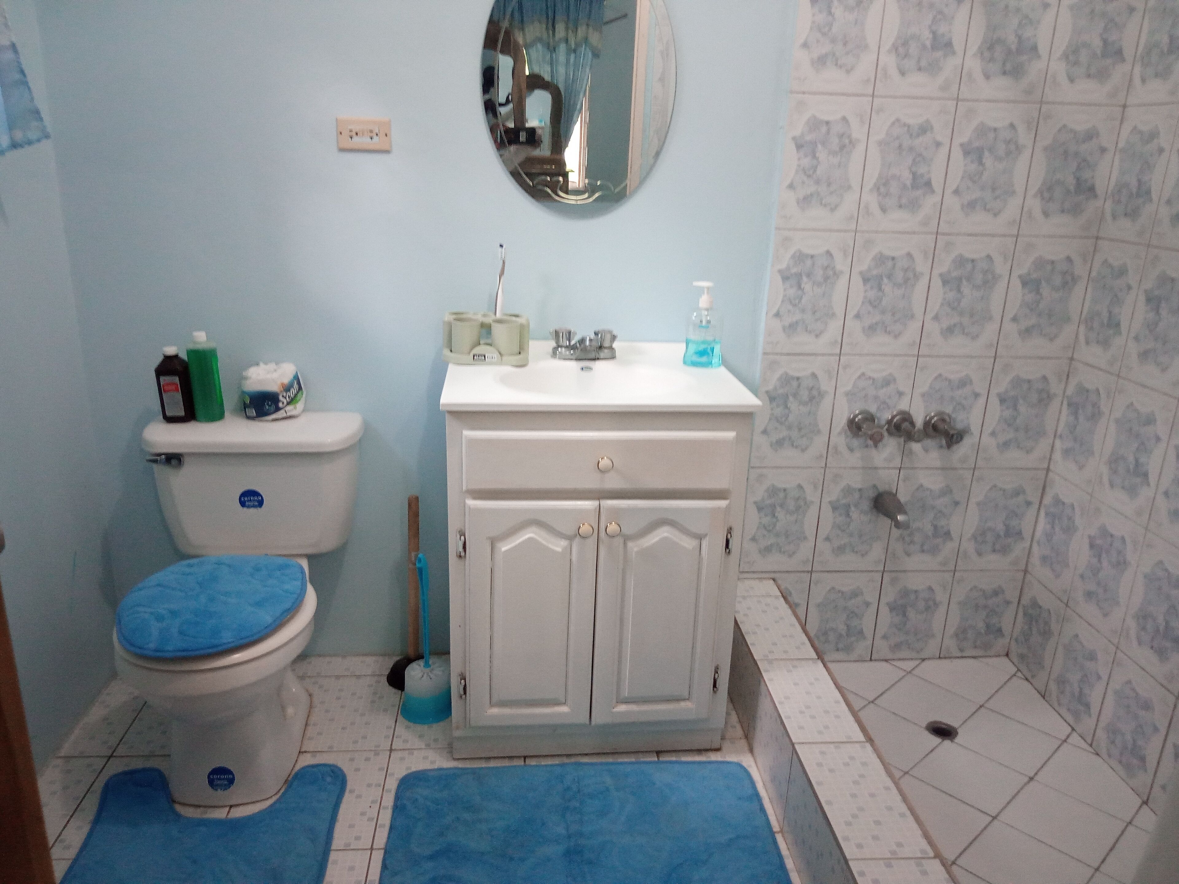 Shower, towels, soap, shampoo