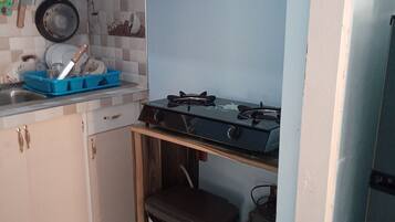 Fridge, stovetop, electric kettle, toaster