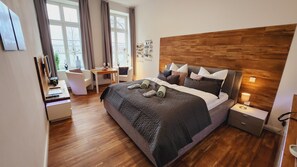 1 habitación, tabla de planchar con plancha, wifi gratis y ropa de cama 