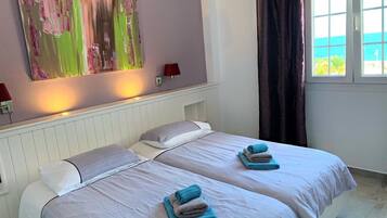 2 habitaciones, tabla de planchar con plancha y wifi gratis