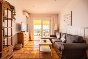 TV - 'Sunny Apartment Front Line Burriana' Near the Beach with Sea View, Wi-Fi, A/C & Balcony (Nerja)