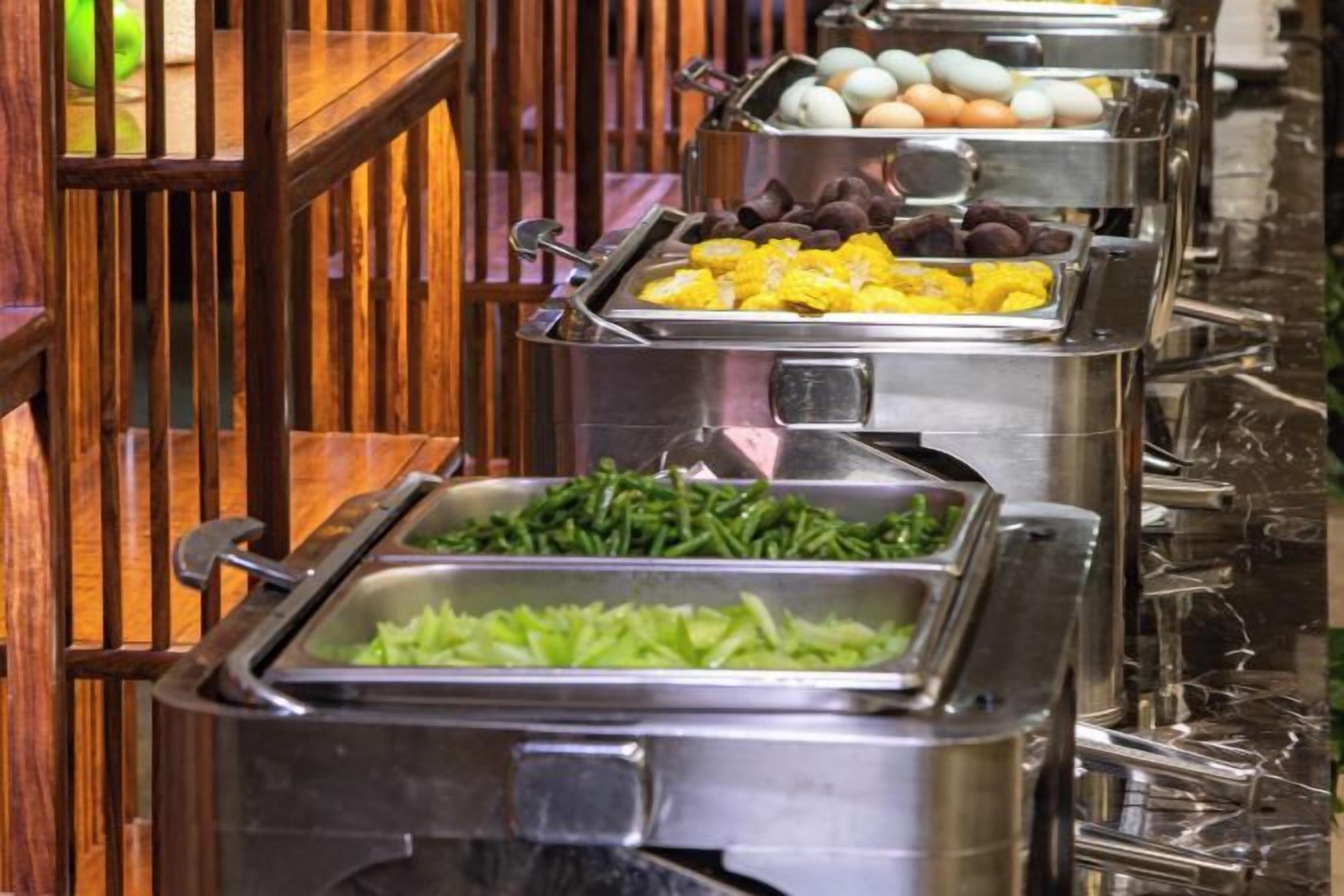 A buffet with various food options.