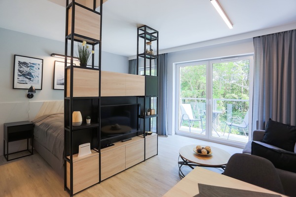 Standard Studio Suite | Living area | 40-inch flat-screen TV with digital channels, TV