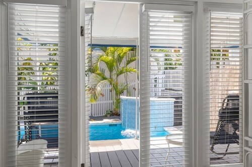 Shared Heated Pool, Near Duval - Poolside Retreat