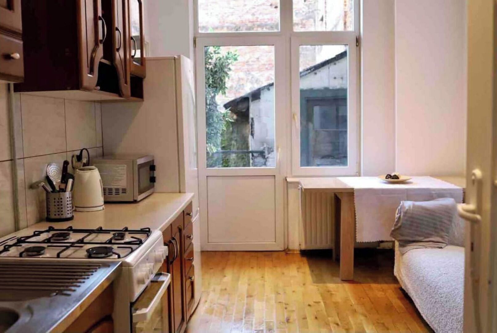 Fridge, microwave, electric kettle, cookware/dishes/utensils