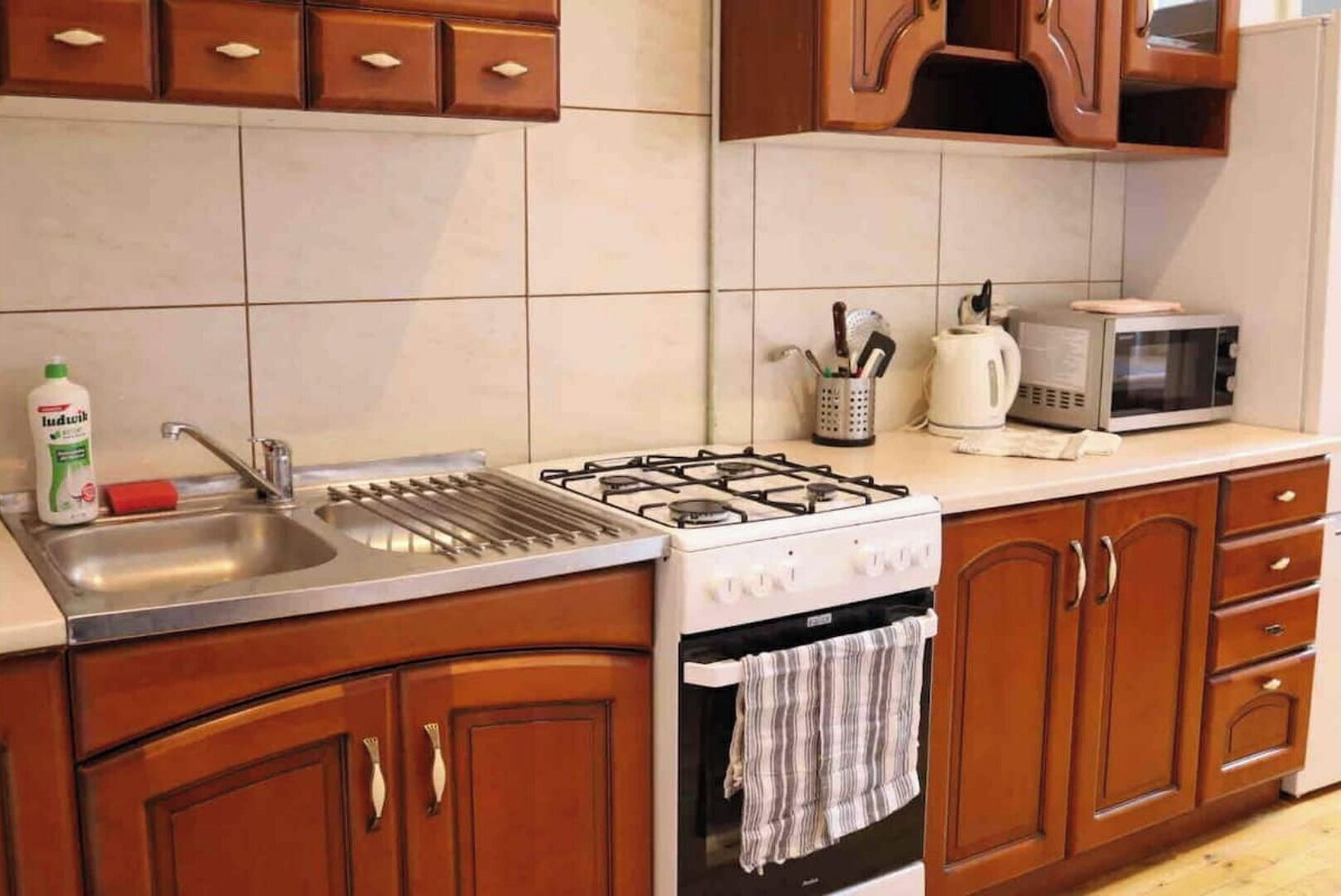 Fridge, microwave, electric kettle, cookware/dishes/utensils