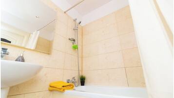 Combined shower/bathtub, hair dryer
