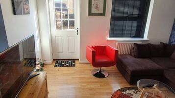 House | Living area | 30-inch TV with cable channels