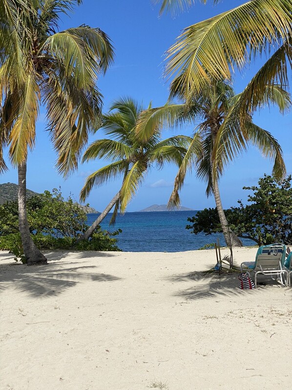 On the beach, sun-loungers, beach towels