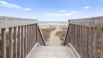 On the beach, sun loungers, beach towels
