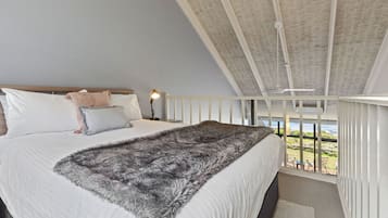 1 bedroom, desk, iron/ironing board, travel crib